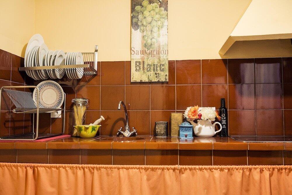 Foto de una habitación de Aparthotel Lo Raconet de la Plaça