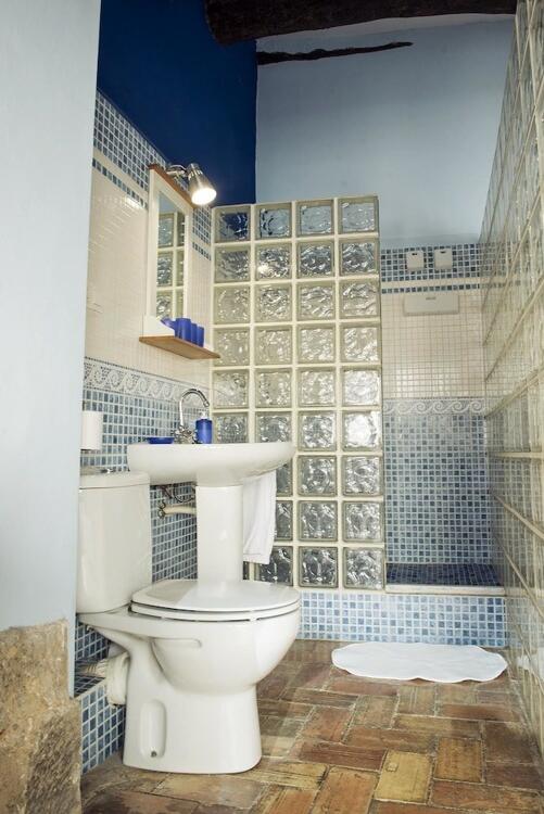 Foto de una habitación de Aparthotel Lo Raconet de la Plaça