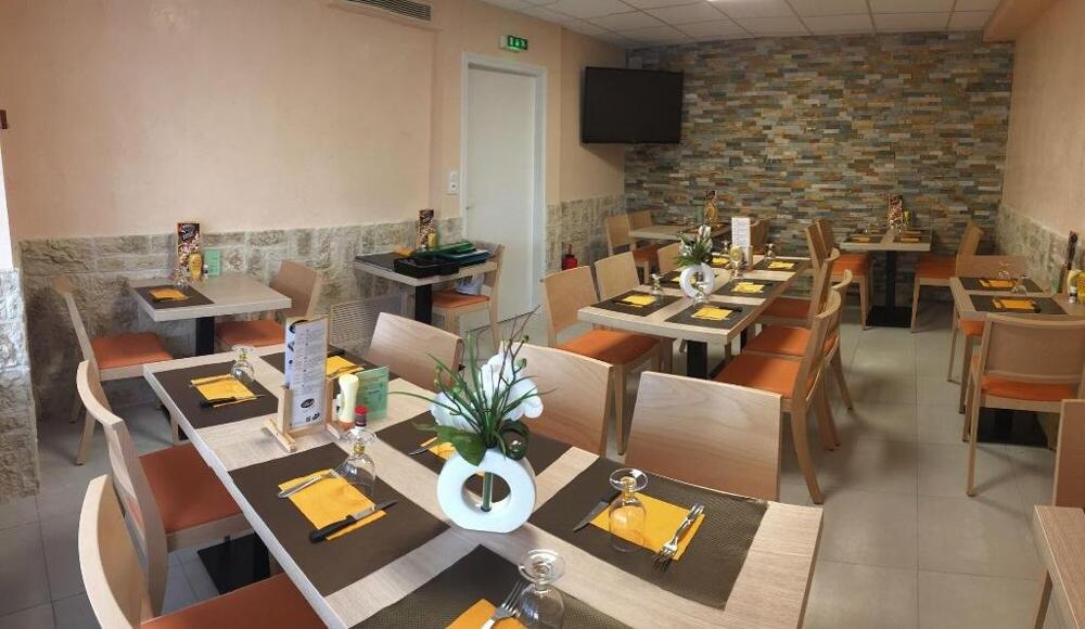 Foto de restauración de Hotel du Commerce