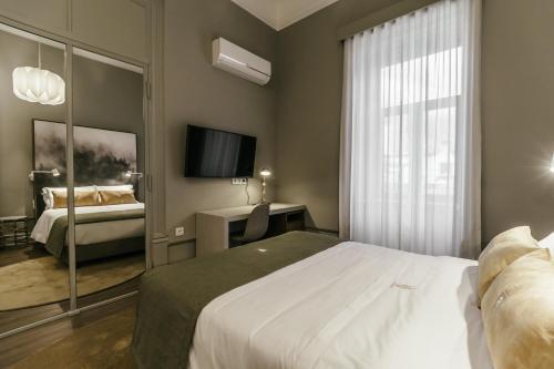 Foto de una habitación de Apartamentos Royal Collection Covilhã