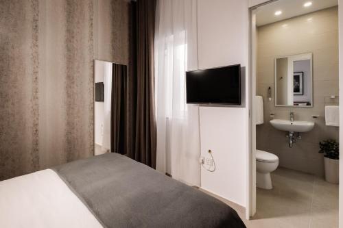 Foto de una habitación de Urban Isle Hotel