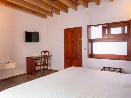 Foto de una habitación de Hotel Casa Real del Café