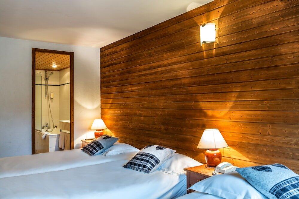 Foto de una habitación de Hotel Les Crêtes Blanches
