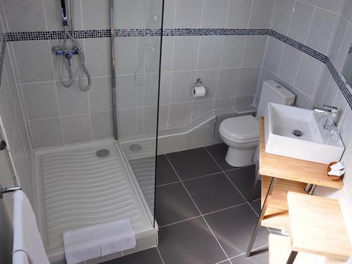 Foto del baño de Hôtel La Baïne