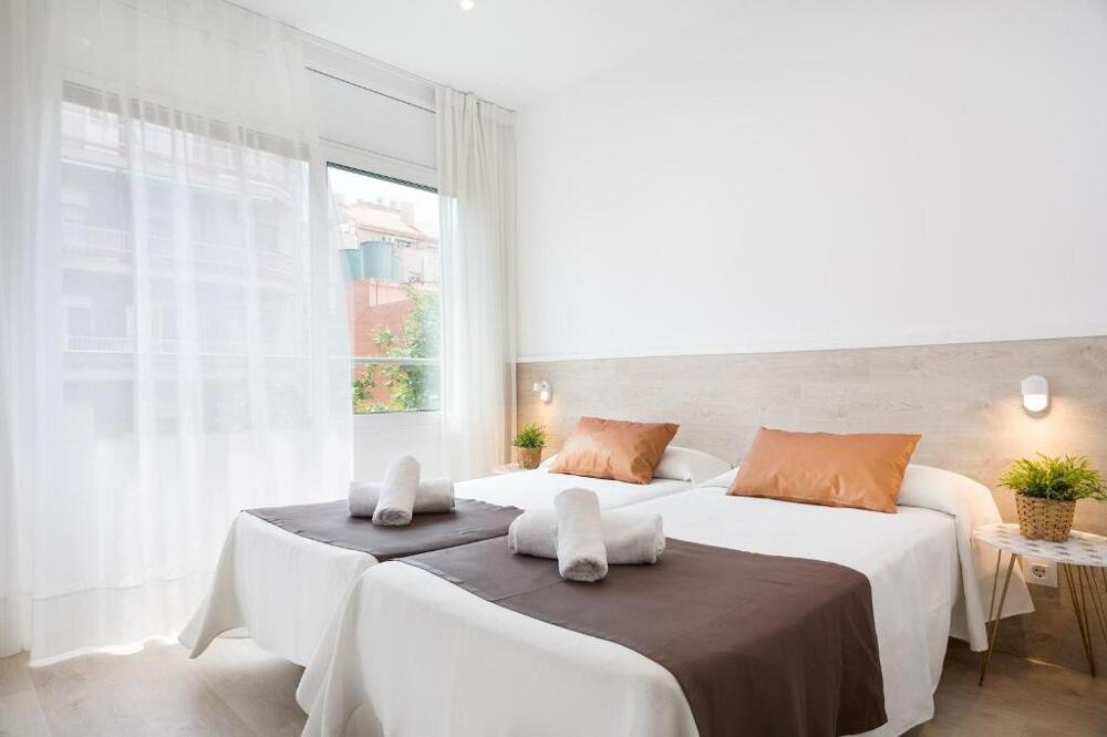 Foto de una habitación de Aparthotel BcnStop Sagrada Familia