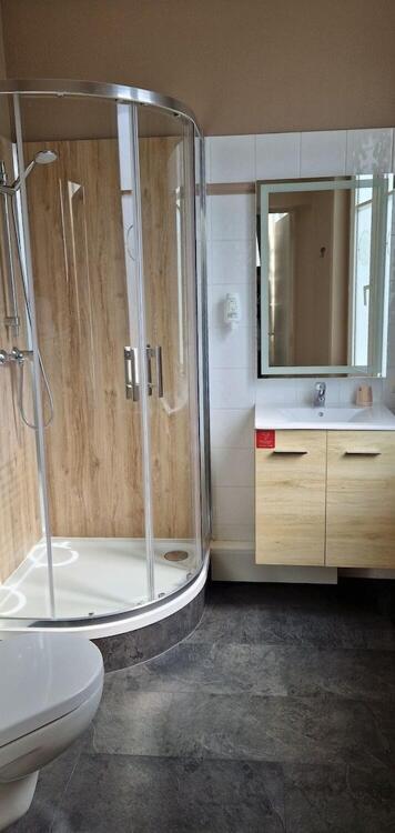 Foto del baño de Hôtel Du Commerce