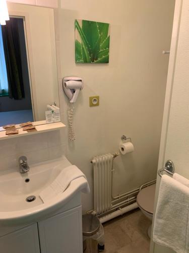 Foto de una habitación de Hôtel de la Plage