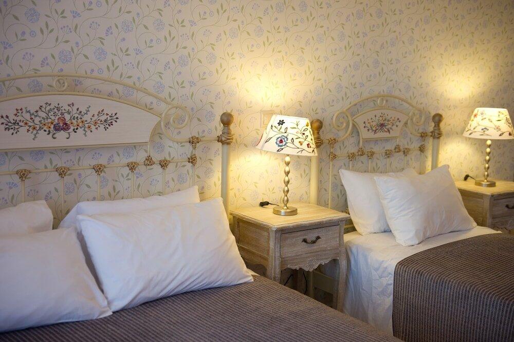 Foto de una habitación de Hotel Kastro Maistro