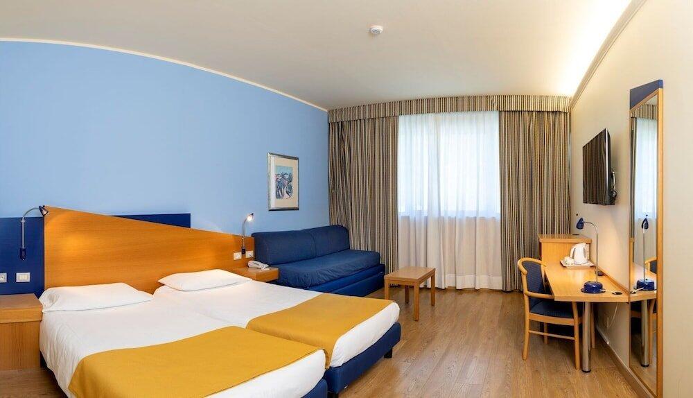 Foto de una habitación de Hotel Express Aosta East