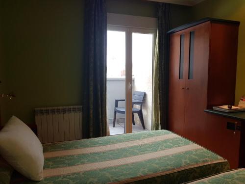 Foto de una habitación de Hotel Idh Angel