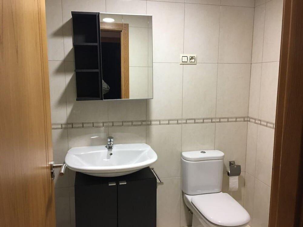 Foto del baño de Hotel Playa de Quenxe
