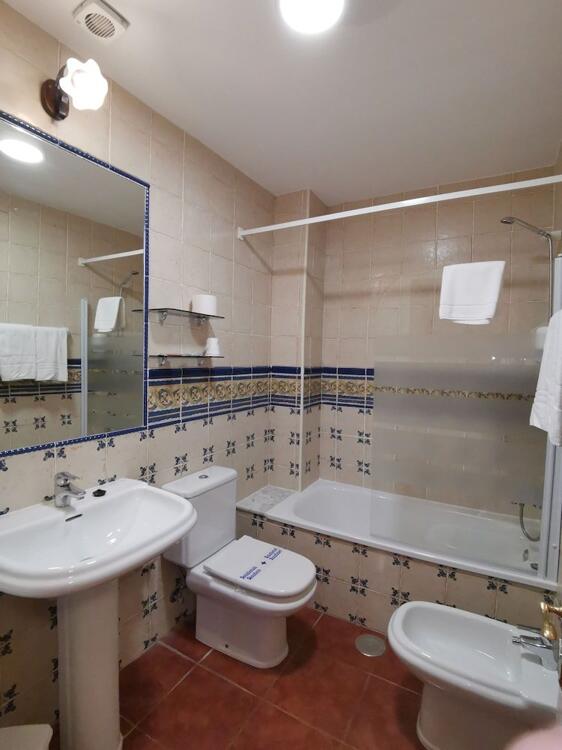 Foto del baño de Hotel El Angliru