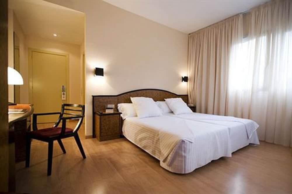 Foto de una habitación de Hotel Sercotel Air Penedès
