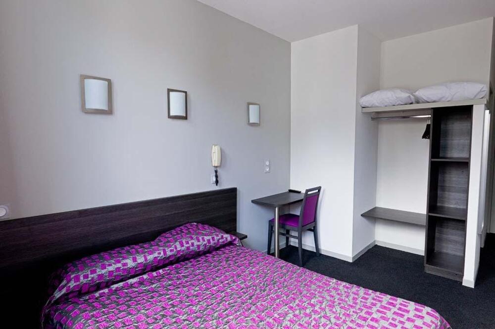 Foto de una habitación de Hôtel Saint Etienne