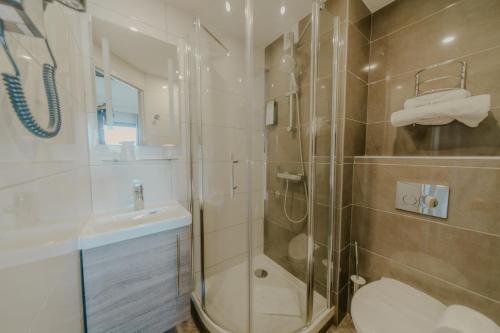 Foto del baño de KYRIAD DIRECT ORLEANS NORD - Cap Saran