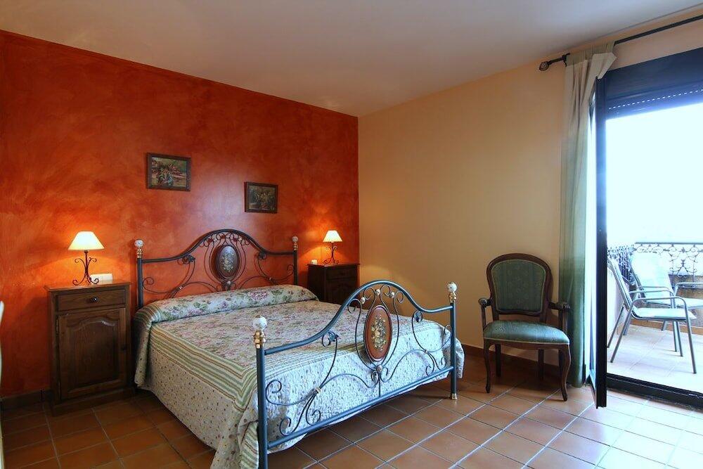 Foto de una habitación de Hotel Rural Hojaranzos