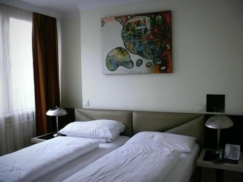 Foto de una habitación de Hotel Attaché
