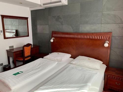 Foto de una habitación de Hotel Attaché