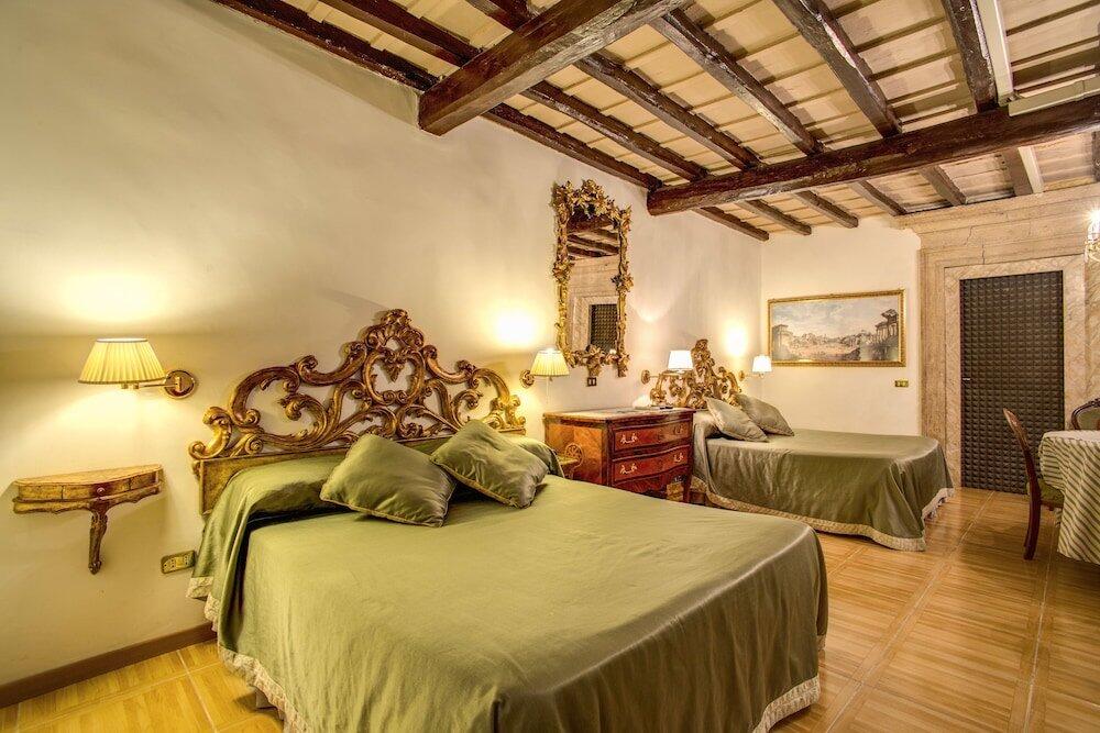 Foto de una habitación de Bed-and-Breakfast Navona Gallery Suites
