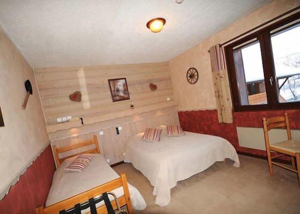 Foto de una habitación de Hotel La Boule de Neige