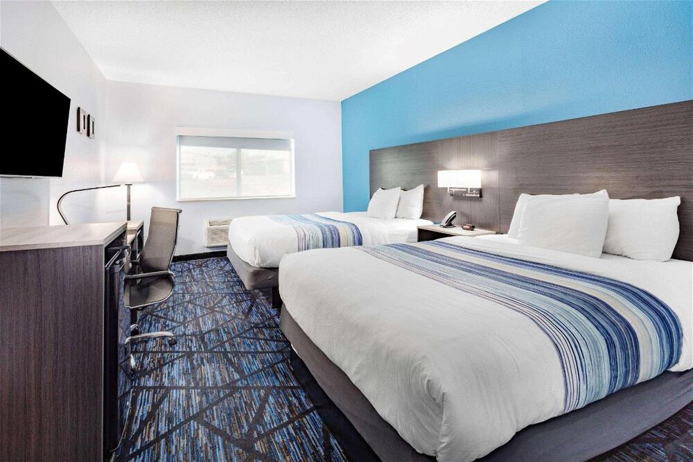 Foto de una habitación de Hotel AmericInn by Wyndham Quincy
