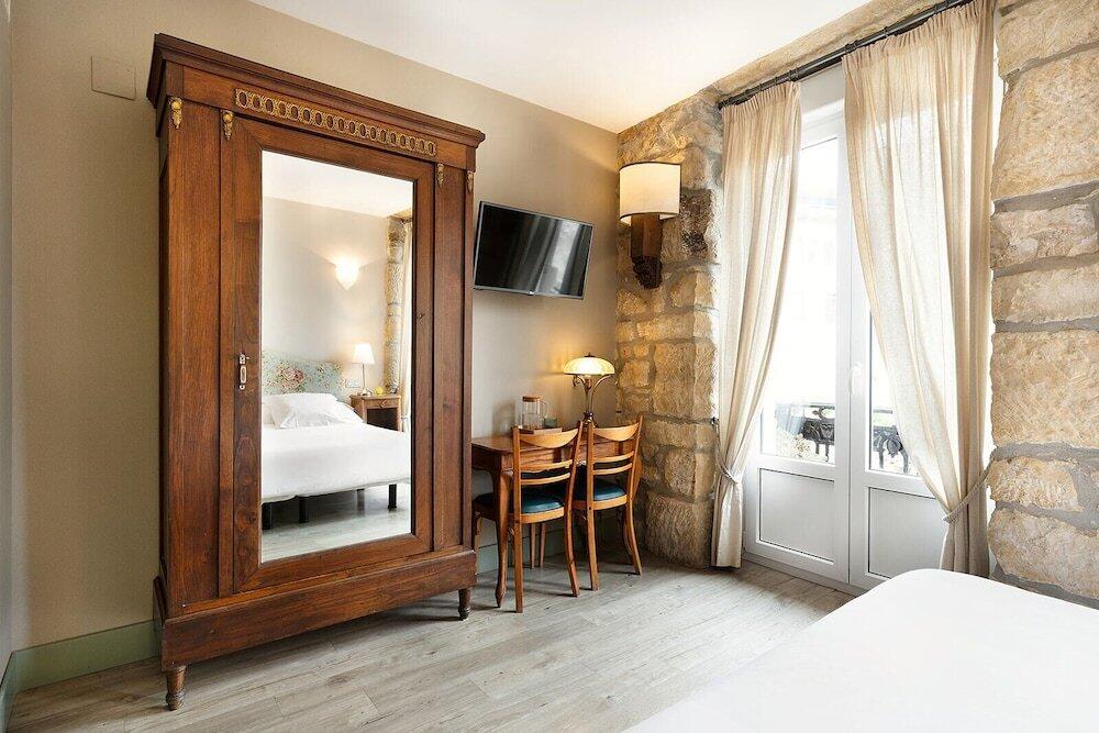 Foto de una habitación de Okako Hotel