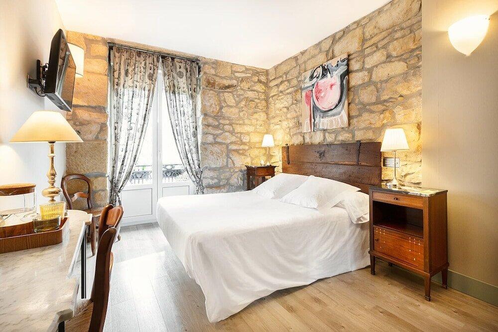 Foto de una habitación de Okako Hotel