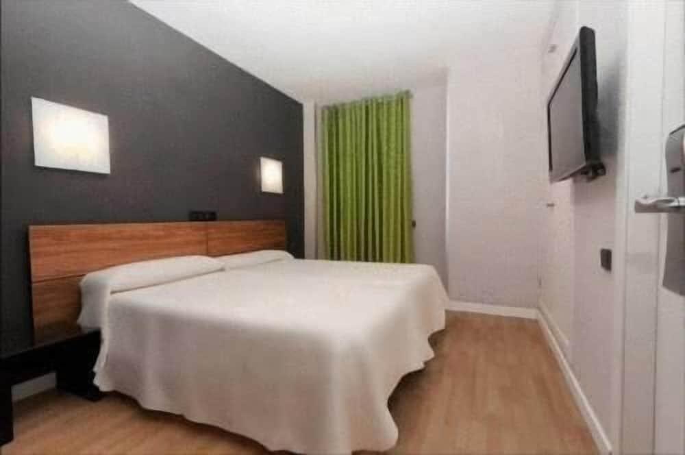 Foto de una habitación de Hostal Un Punto Chic-Joaquin Costa