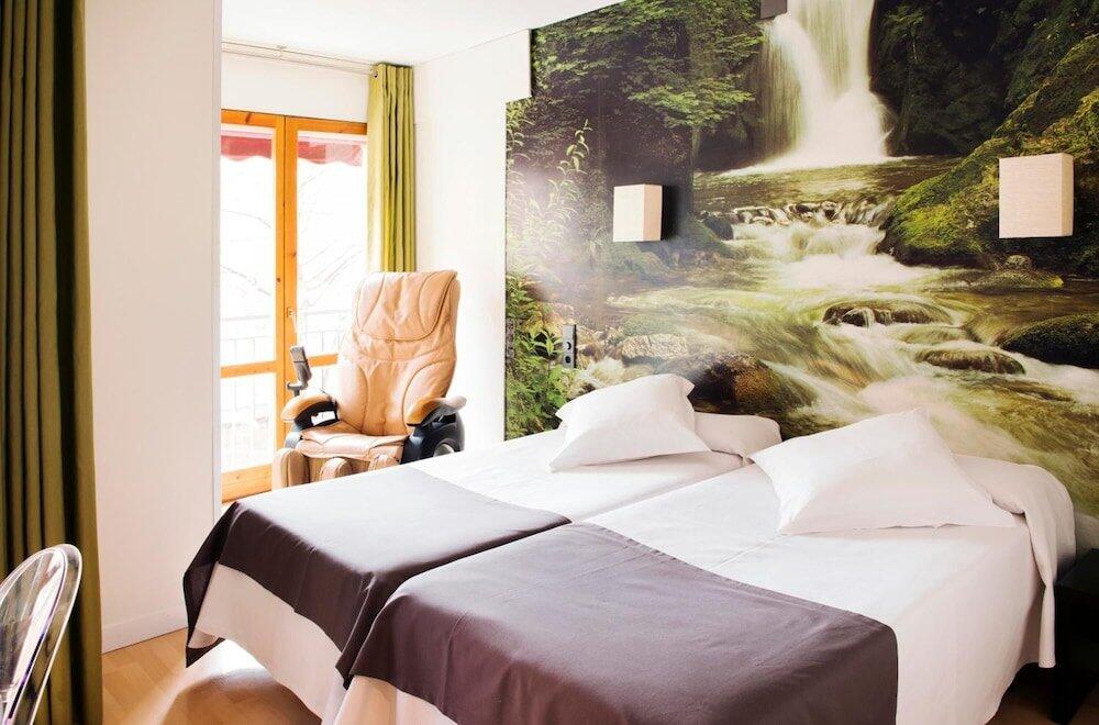 Foto de una habitación de Hostal Un Punto Chic-Joaquin Costa
