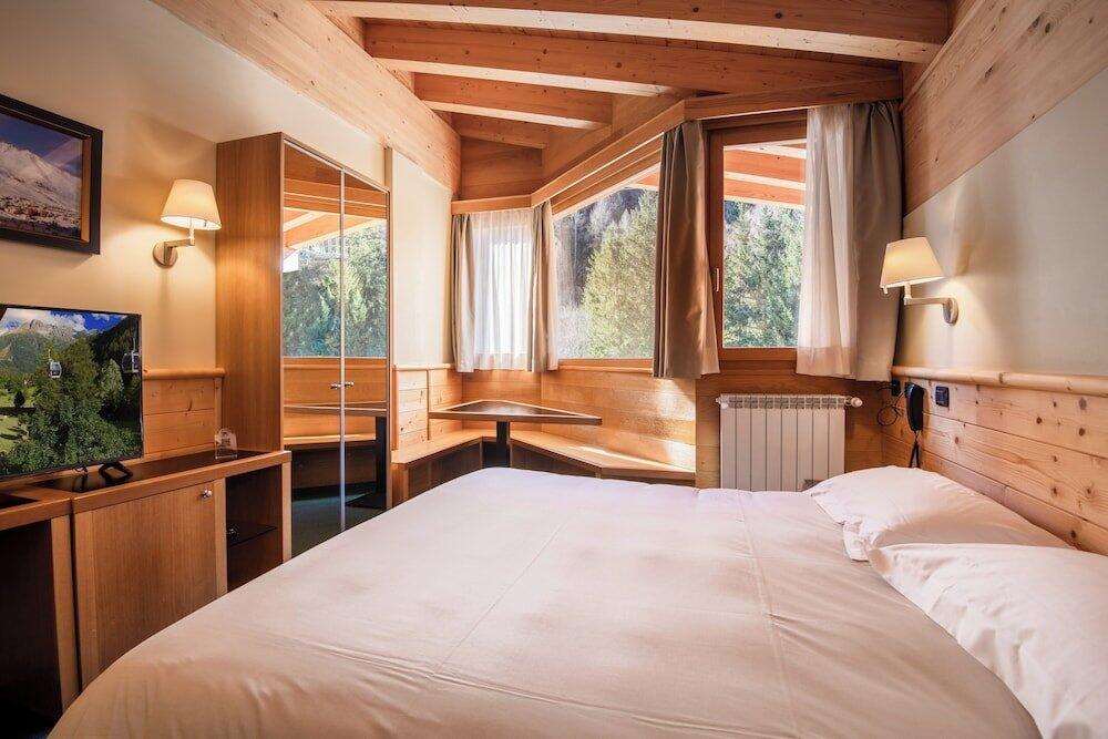 Foto de una habitación de Hotel Garni Pegrà