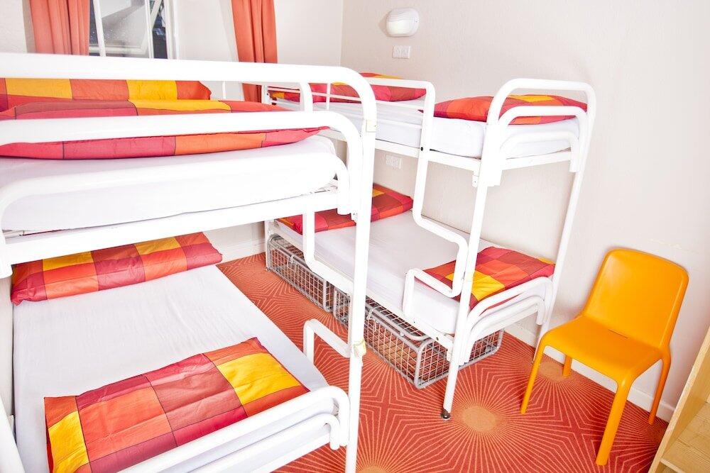 Foto de una habitación de Snoozles Quay Street Tourist Hostel