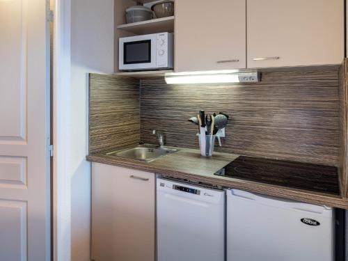 Foto de una habitación de Aparthotel Noemys Castor &amp;amp; Pollux