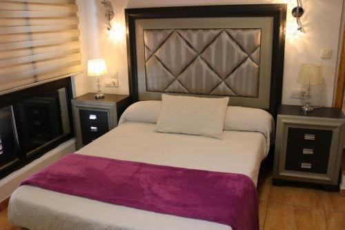 Foto de una habitación de Apartamentos La Carmen