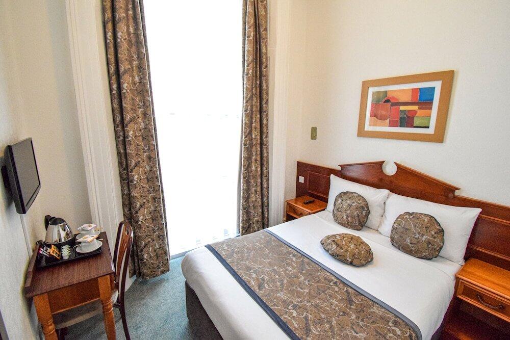 Foto del baño de Pembridge Palace Hotel