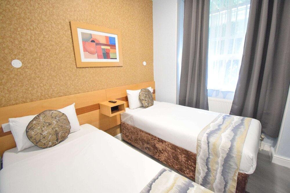 Foto de una habitación de Pembridge Palace Hotel
