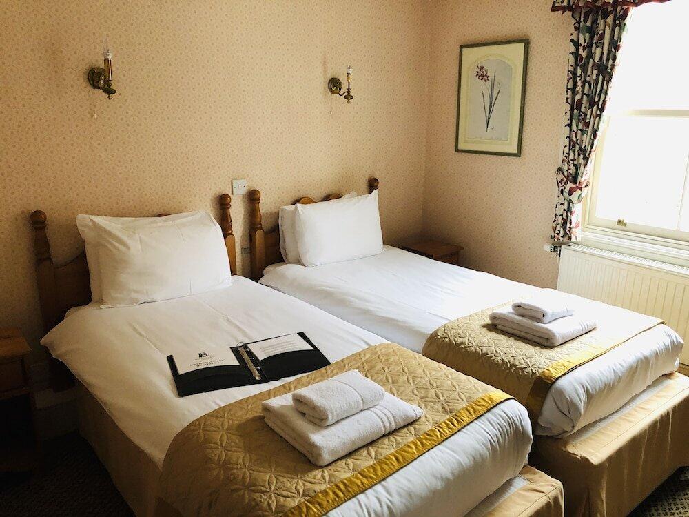 Foto de una habitación de Brook Red Lion Hotel