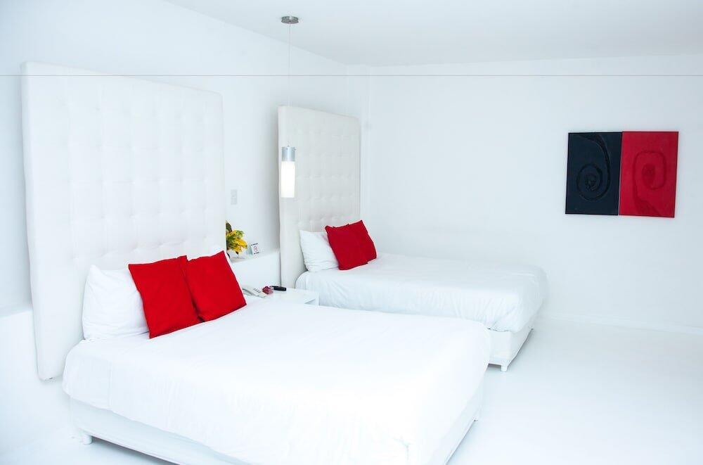 Foto de una habitación de Le Cameleon Boutique Hotel