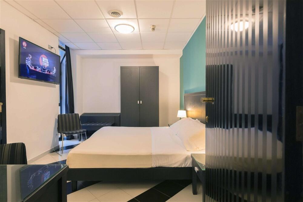 Foto de una habitación de Executive Business Hotel