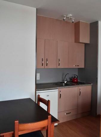 Foto de una habitación de Apartamentos Arcos Playa