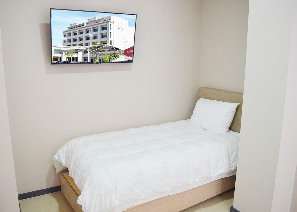 Foto de una habitación de Aparthotel Marina Suites