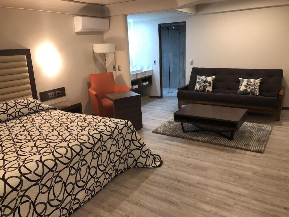 Foto de una habitación de Econo Express Hotel