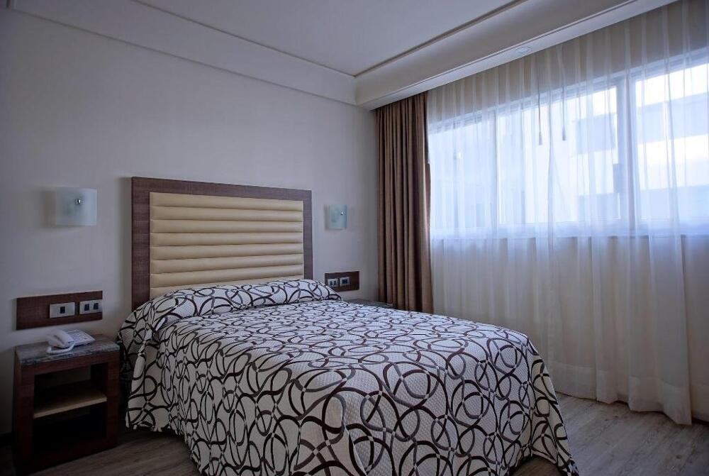 Foto de una habitación de Econo Express Hotel