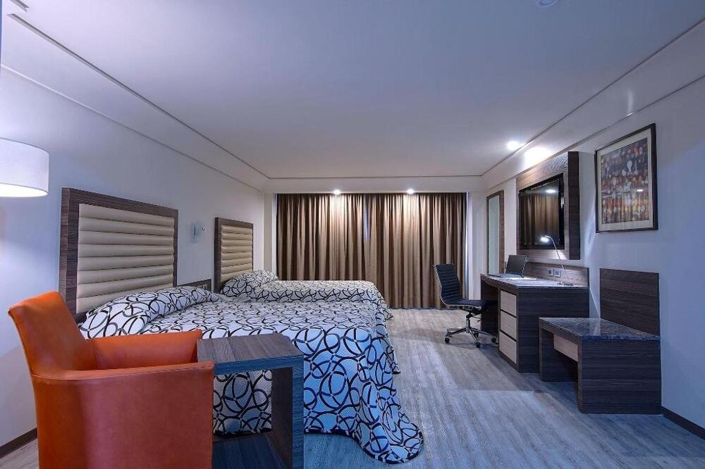 Foto de una habitación de Econo Express Hotel