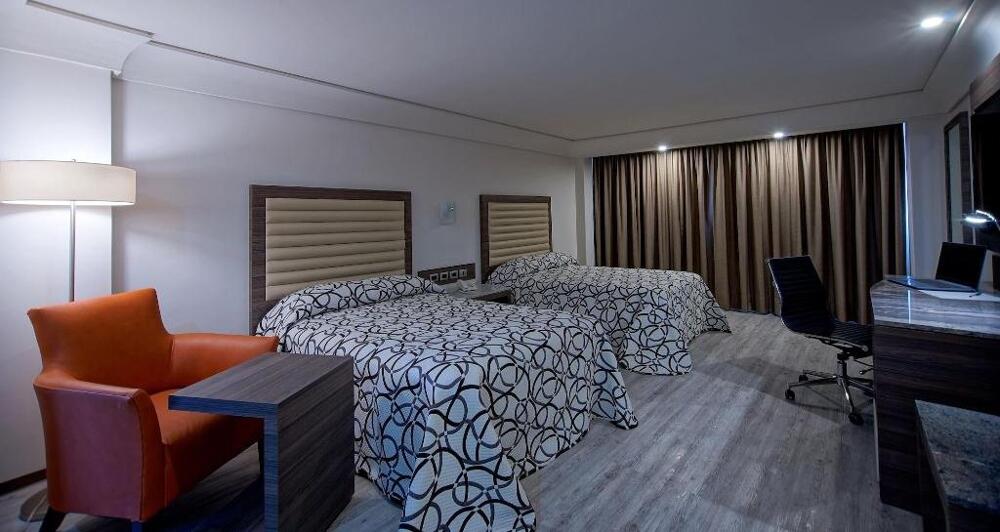 Foto de una habitación de Econo Express Hotel