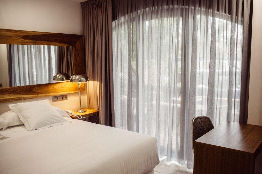 Foto de una habitación de Hotel Cuevas - Adults Only