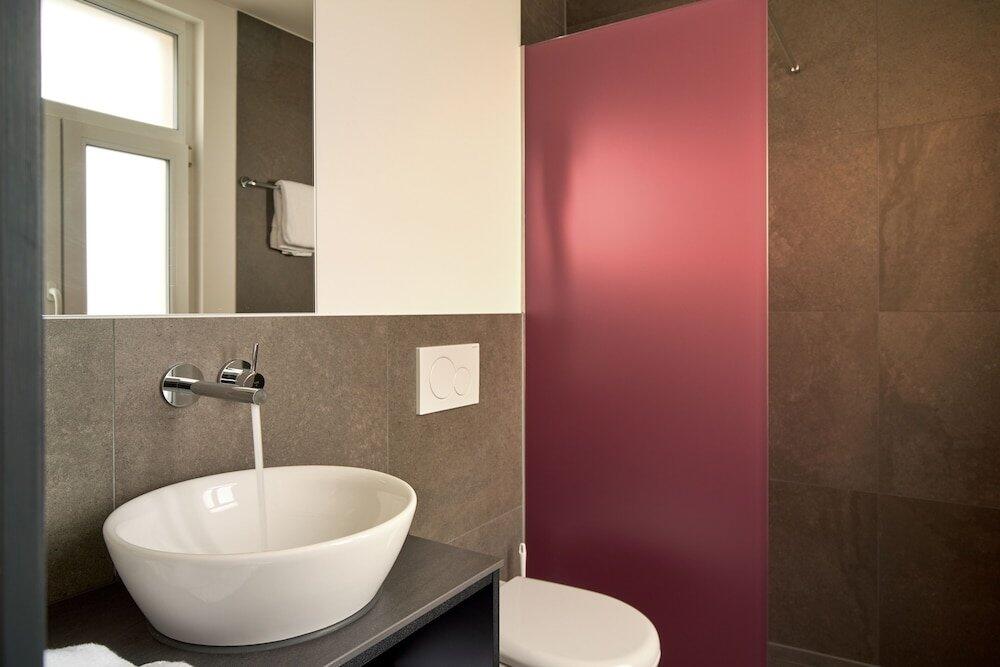 Foto del baño de The Hey Hotel