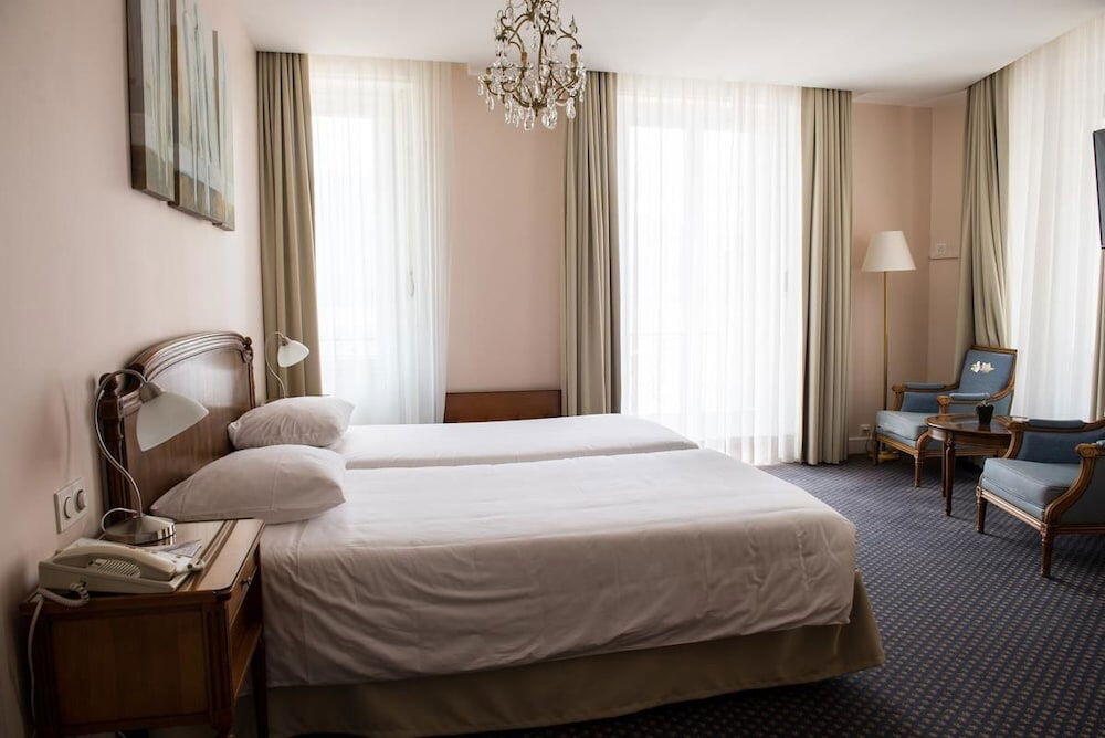 Foto de una habitación de Hotel Eden Palace au Lac