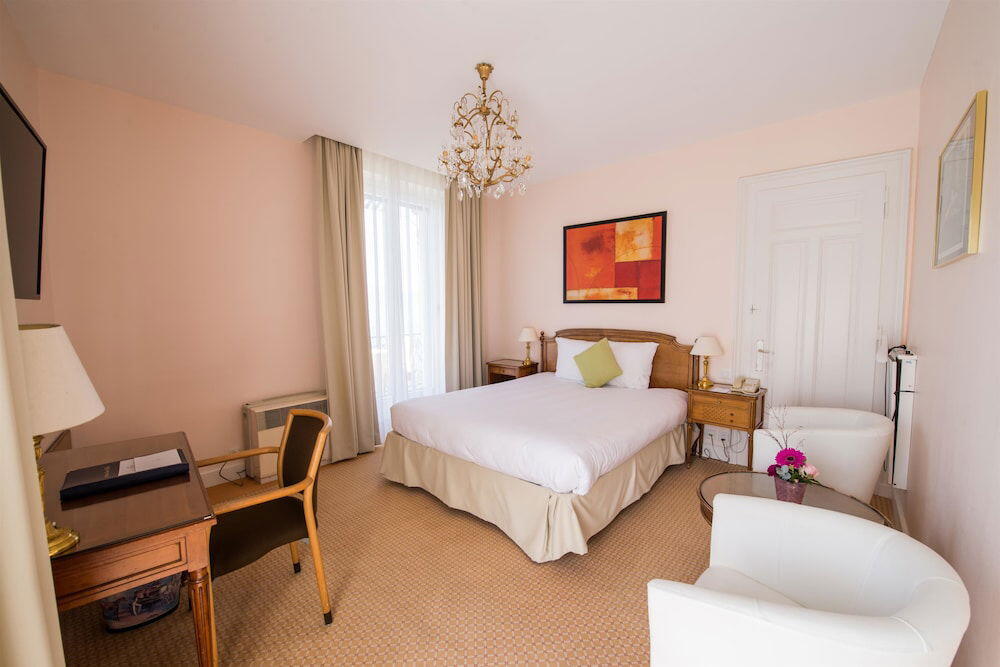 Foto de una habitación de Hotel Eden Palace au Lac