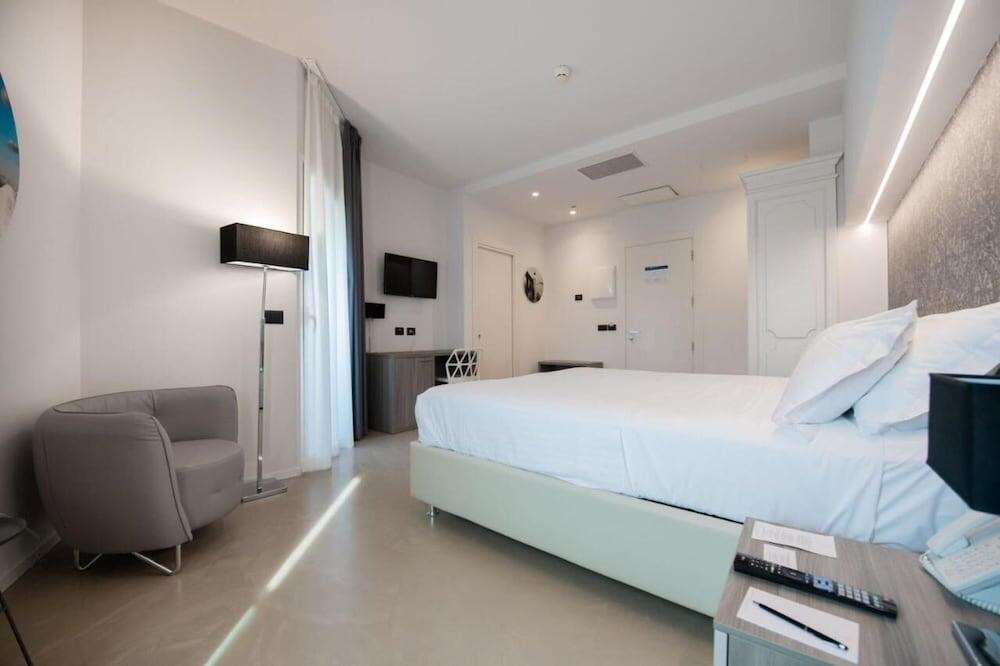 Foto de una habitación de Grand Hotel Faraglioni