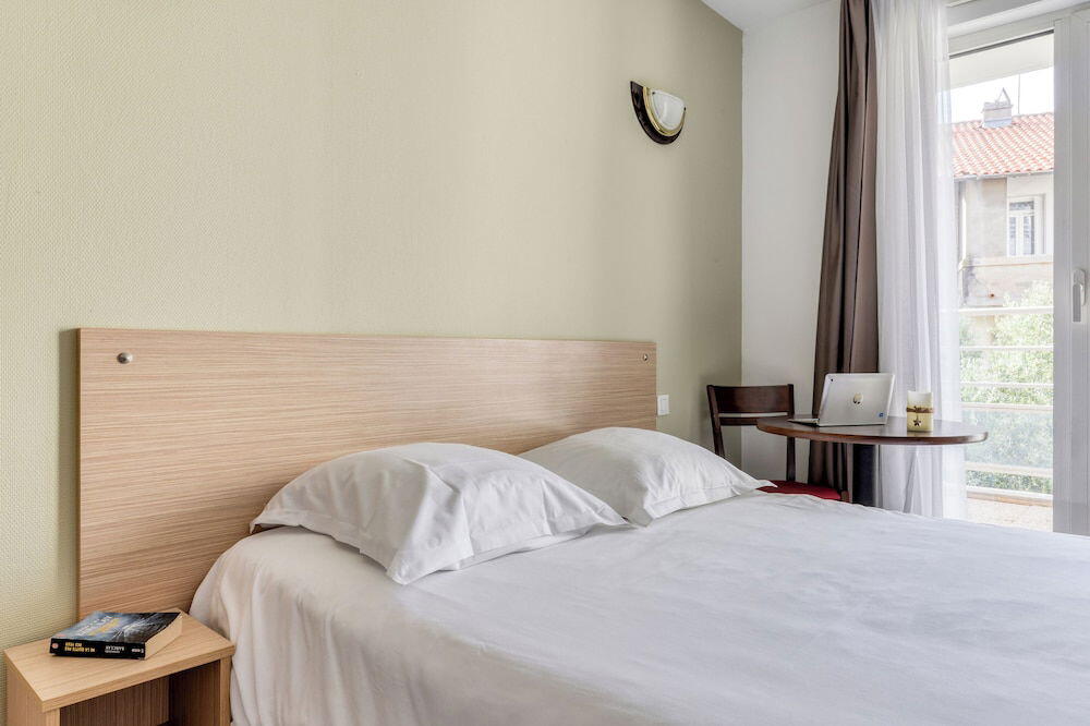 Foto de una habitación de Zenitude Hôtel-Résidences Béziers Centre